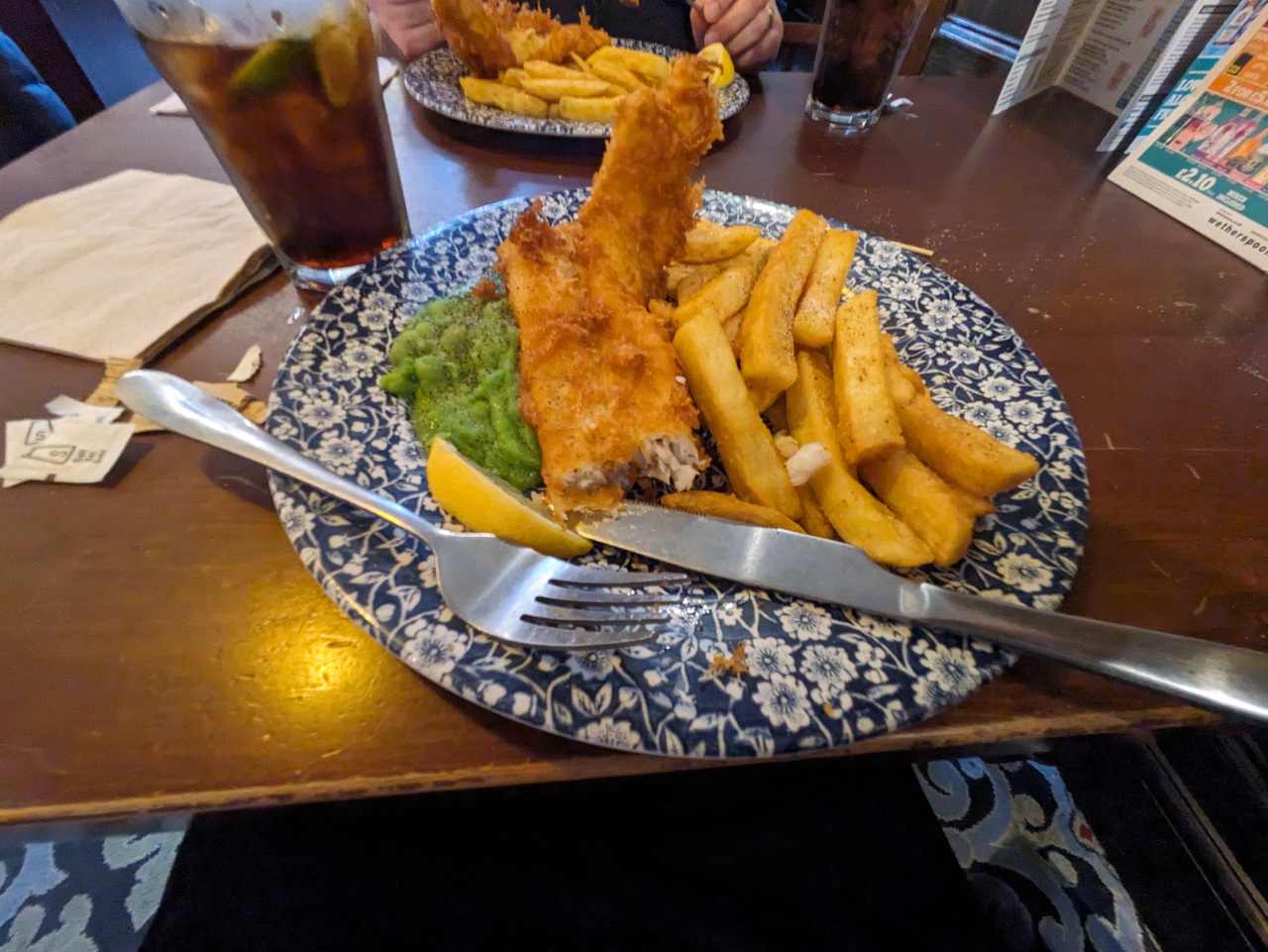 Cod &amp; Chips with Mushy peas, served with Pepsi Max.