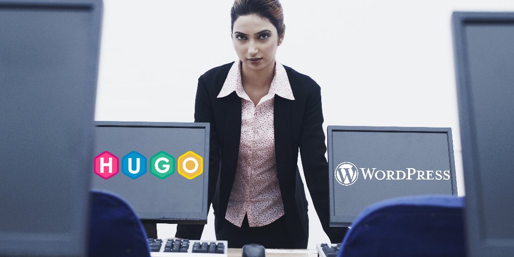 Women next to multiple monitors. One monitor with the Hugo static site generator logo and the other with the WordPress logo.